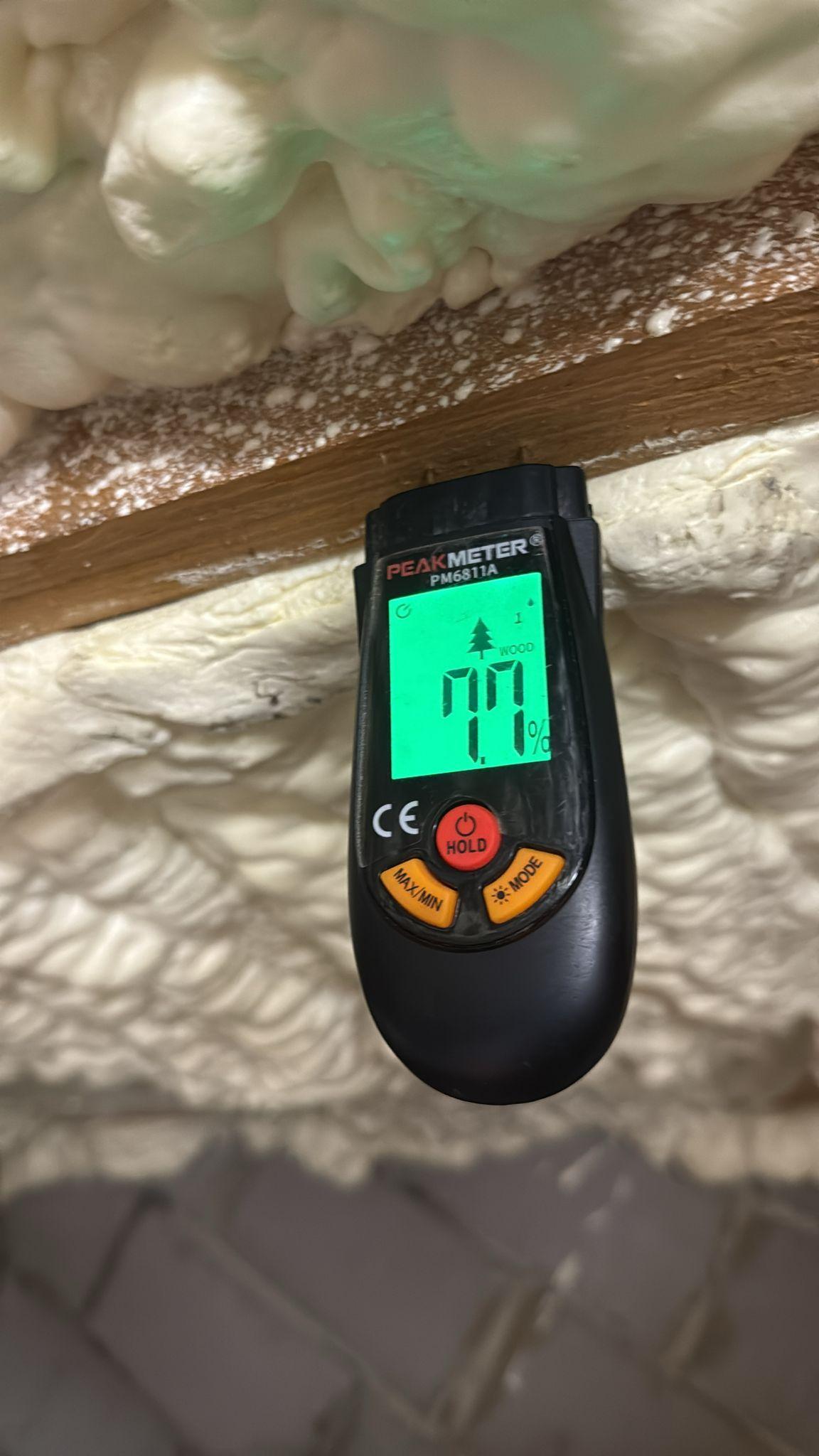 Damp meter assessment during spray foam inspection in Sheffield